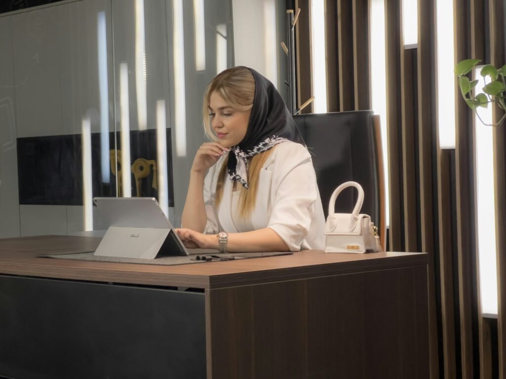 a woman sitting at a desk